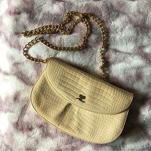 courreges pastel yellow crossbody purse with gold chain strap